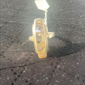Gold Oval Sapphire Ring with Bezel Setting